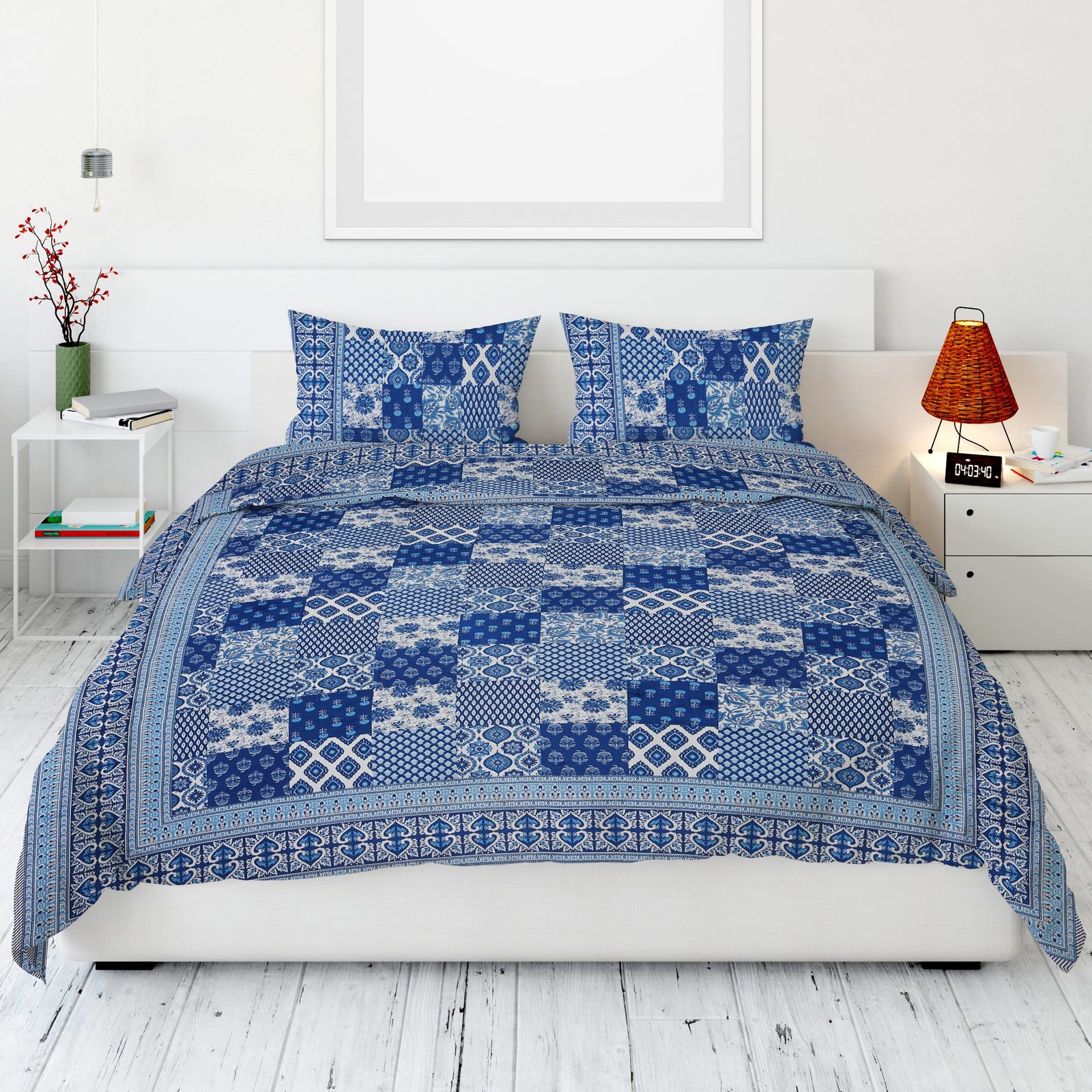 Product photography of a blue Sanganeri print bedsheet in Jaipur, emphasizing its detailed design and vibrant color