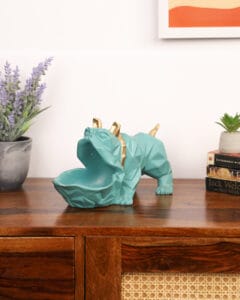 Rustic wooden tray with candles and books, styled and shot in studio with warm lighting by Emipix Solutions